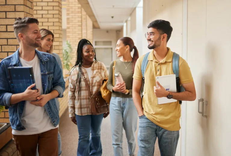 education-diversity-students-walking-conversation-collaboration-group-project-research-college-young-people-friends-academics-hallway-talking-brainstorming-idea